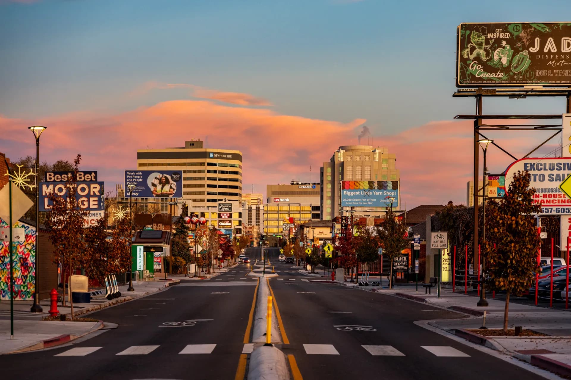 Virginia Street in Midtown Reno at sunset — the neighborhoods where furnished mid-term rentals compete